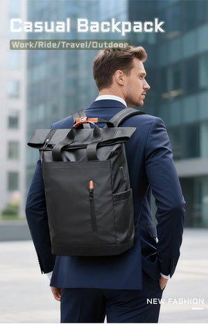 Black roll-top waterproof backpack worn for work, ride, travel, or outdoor use.