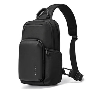 Black compact waterproof crossbody bag with top handle and adjustable shoulder strap