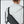 Black waterproof crossbody sling worn on shoulder with adjustable strap