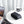 Black compact waterproof tech storage bag with zipper, placed on a desk surface