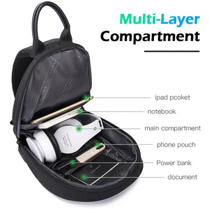 Black sling bag opened to show interior pockets for phone, tablet, and documents