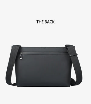 Black back view messenger bag with zipper pocket and two-tone shoulder straps
