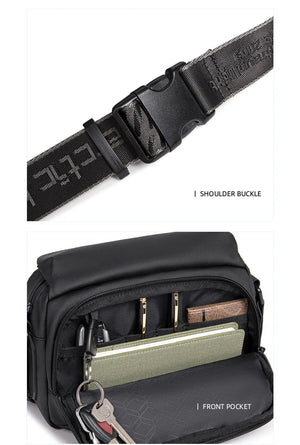 Black crossbody bag showing front pocket and webbing shoulder strap with buckle