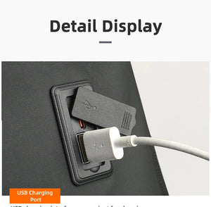 Black waterproof travel backpack USB charging port with charging cable connection detail