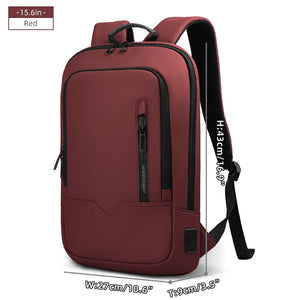 Red compact waterproof backpack with front pocket, side strap, and USB port panel