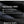 Black textured travel backpack fabric, high-density 1680D weave detail