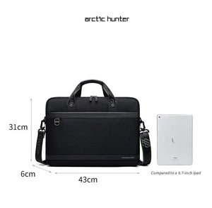 Black laptop bag with top handle, front zipper pocket, and side shoulder straps