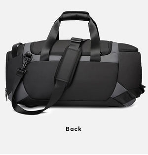 Black waterproof duffle bag back view with padded handles and adjustable strap
