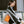Lightweight waterproof crossbody bag in orange with adjustable shoulder strap
