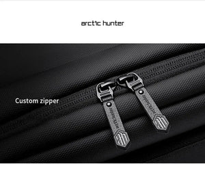 Black bag fabric and zipper close-up labeled custom zipper with branded pulls