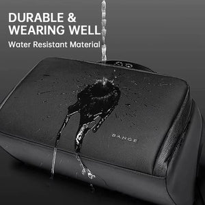 Black waterproof toiletry bag with textured surface and logo, water droplets on top.
