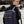 Navy waterproof commuter backpack worn by person with front buckle pocket