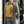 Yellow and black compact waterproof backpack worn by man with front zip pocket
