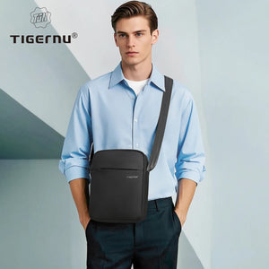 Black lightweight waterproof crossbody bag with adjustable shoulder strap