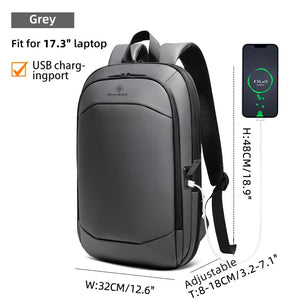 Grey backpack with front panel, padded shoulder straps, and side USB charging port