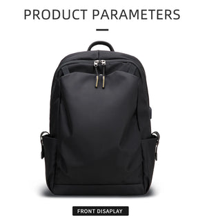Black commuter backpack front view with dual zipper and top handle