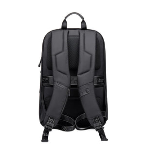 Black large-capacity travel backpack with padded back panel and adjustable shoulder straps
