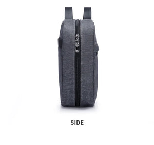 Gray collapsible waterproof toiletries bag side profile with zipper and carry handle
