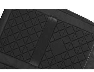 Black compact backpack back panel with geometric textured padding and webbing strap
