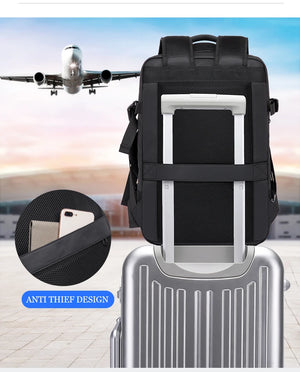 Large backpack positioned over rolling luggage handle, front mesh pocket detail