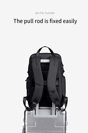Waterproof travel backpack with extended trolley pull handle at the back