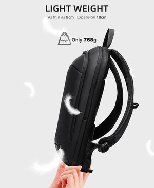 Lightweight black expandable backpack with padded back panel and adjustable shoulder strap