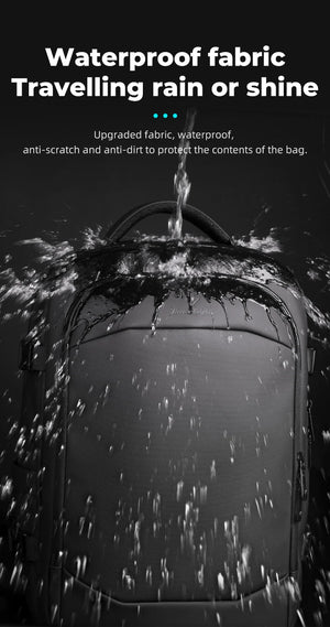 Black waterproof backpack with water droplets on treated fabric surface