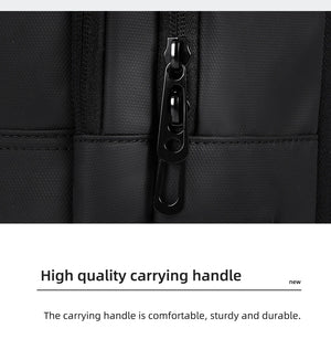 Black compact backpack top carrying handle with reinforced stitching