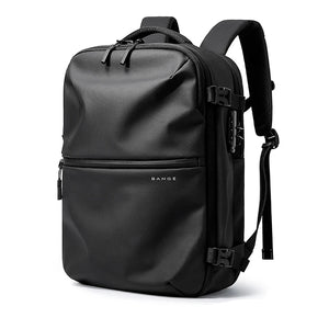 Black waterproof travel backpack with front zipper, top handle, and adjustable shoulder straps