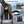 Green travel backpack with back luggage trolley strap and padded shoulder straps