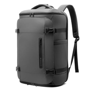 Grey backpack with vertical front zipper, belt buckles, and shoulder strap