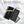 Black leather long wallet with textured finish beside gift box packaging