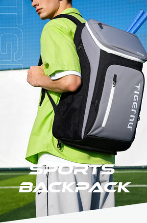 Grey and black sports travel backpack worn on back with front zip pocket