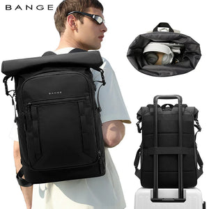 Black roll-top travel backpack with large front pocket and adjustable side straps