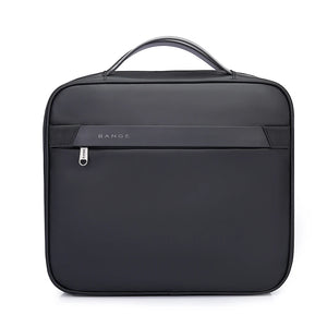 Black collapsible waterproof toiletries bag with top handle and front zip pocket