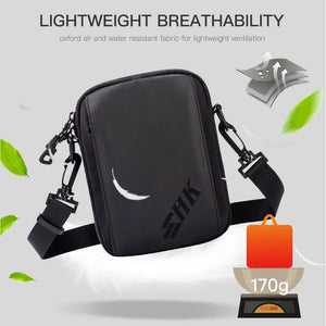 Black lightweight waterproof crossbody bag with zipper front and reinforced flap