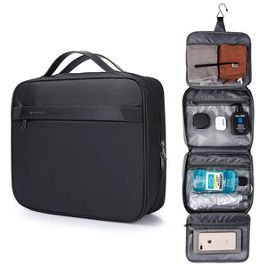 Black travel toiletry bag with open compartments showing organized items on a white background, featuring the brand 'Bange'.