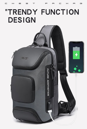 Grey compact crossbody sling bag with USB charging cable and adjustable shoulder strap