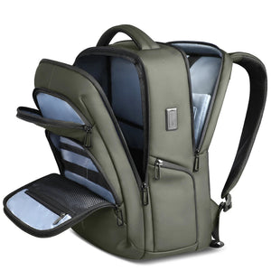 Green waterproof travel backpack with front zip pockets and top carry handle