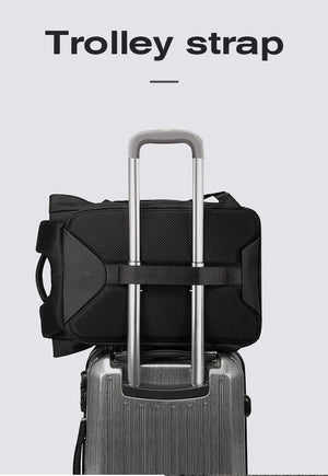 Black travel backpack with adjustable trolley strap and reinforced top carry handles